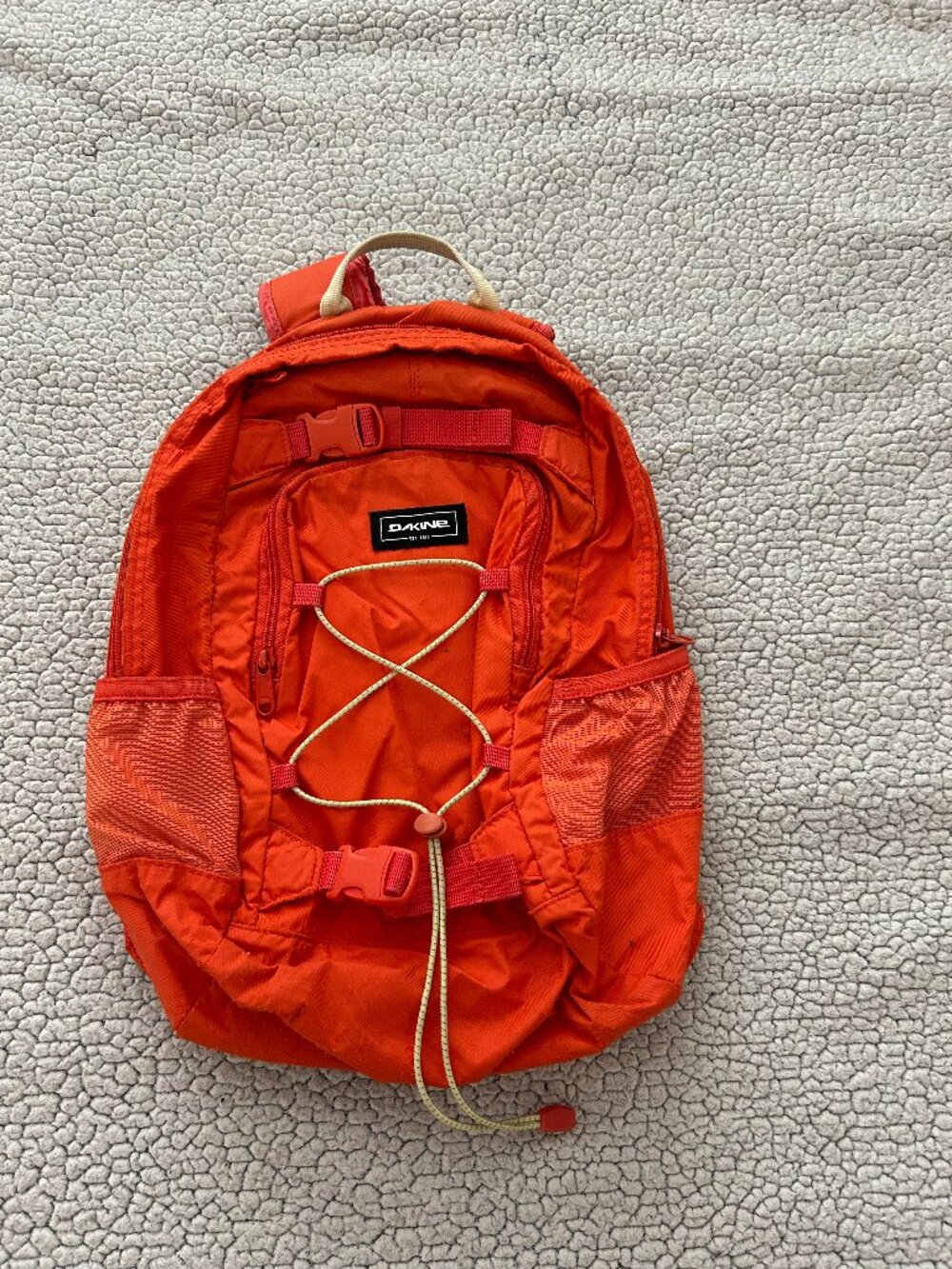Dakine -- orange outerwear small backpack